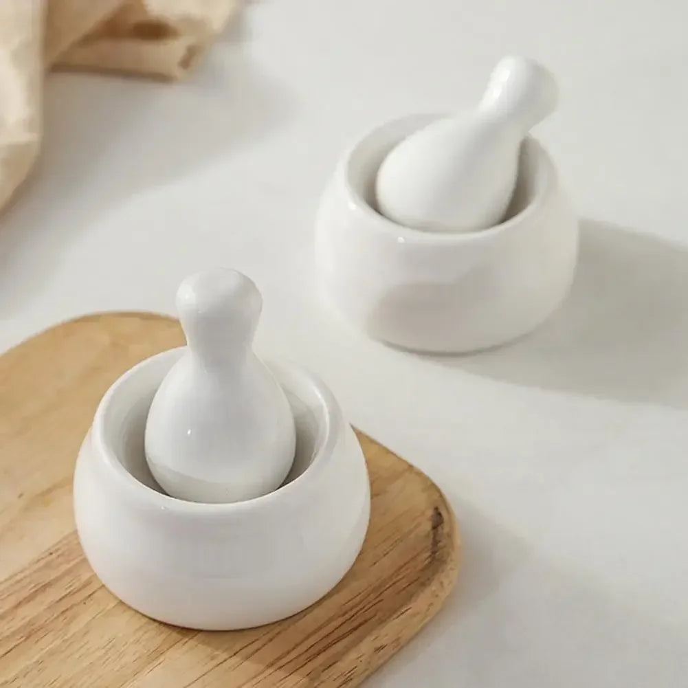 The Everyday Mortar & Pestle - shown on a wooden serving board